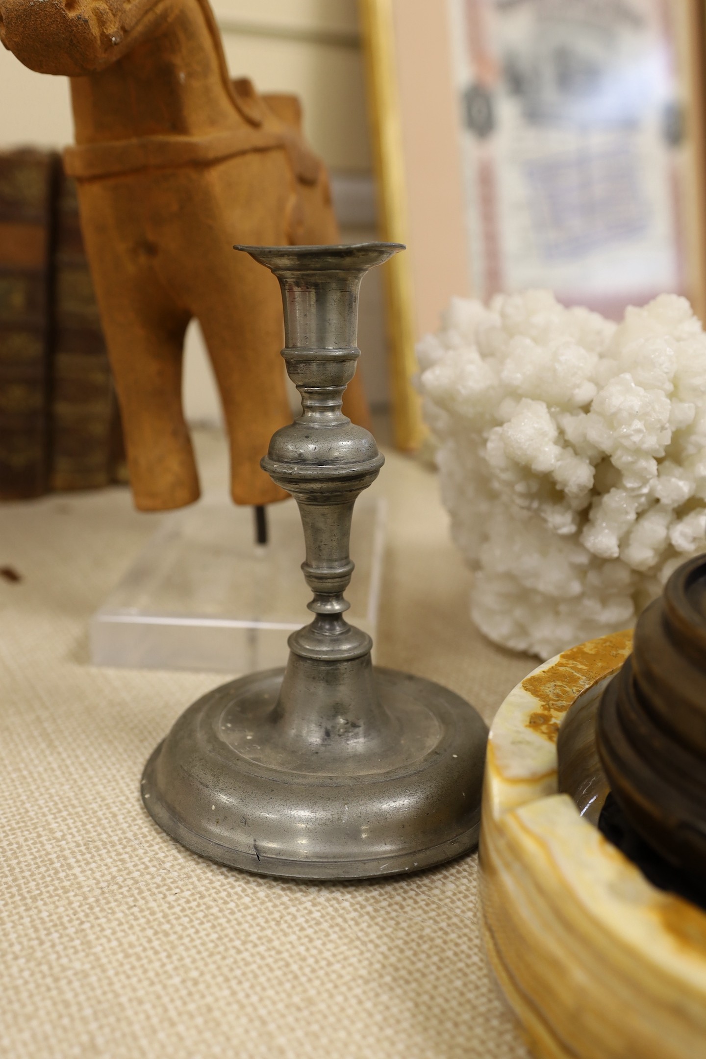 A mounted model of Trojan horse, together with a pewter candlestick, hardwood stands, etc.